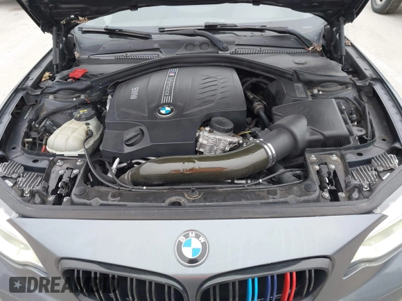 2014 BMW 2 Series M235i with VIN WBA1J7C57EVW84554, listed as a IAAI auction lot 41564175 with 121,632 mi miles and . Bid and sale history available at carsss.com. Image 10.