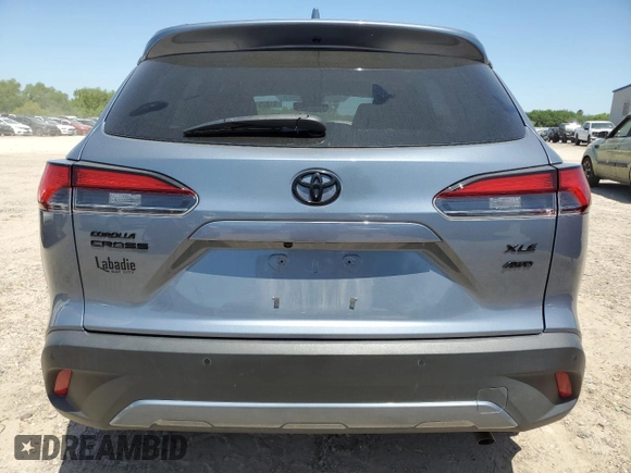 2022 Toyota Corolla Cross XLE z VIN 7MUDAABG8NV035698, wystawiony jako Copart lot #51825195 z przebiegiem 40 987 mil mil oraz Szkoda całkowita • Salvage title. Historia ofert i sprzedaży dostępna na DreamBid. Obrazek 6.