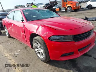 2023 Dodge Charger SXT with VIN 2C3CDXBG9PH595395, listed as a IAAI auction lot 41510459 with 33,974 mi miles. Bid and sale history available at carsss.com. Image 1.