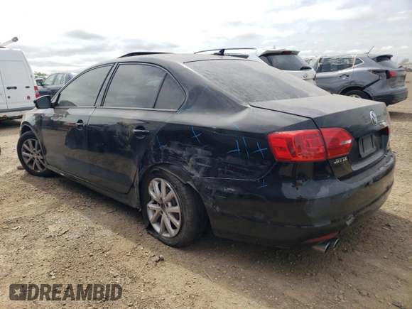 2011 Volkswagen Jetta SE with VIN 3VWDX7AJ6BM395554, listed as a Copart auction lot 57397585 with 139,857 mi miles and Salvage title. Bid and sale history available at DreamBid. Image 2.