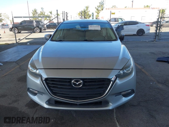 2018 Mazda 3 Touring with VIN 3MZBN1L31JM163466, listed as a IAAI auction lot 40777124 with 101,497 mi miles and . Bid and sale history available at carsss.com. Image 11.