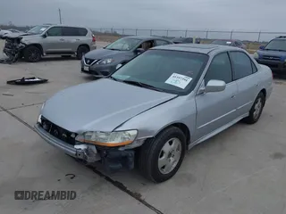 2001 Honda Accord EX z VIN 1HGCG16571A078287, wystawiony jako IAAI lot #41397391 z przebiegiem 238 239 mil mil oraz . Historia ofert i sprzedaży dostępna na DreamBid. Obrazek 6.