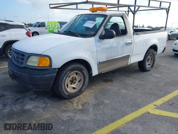 2002 Ford F-150 XL with VIN 1FTRF17W52NB71693, listed as a IAAI auction lot 41952405 with 121,917 mi miles. Bid and sale history available at carsss.com. Image 2.
