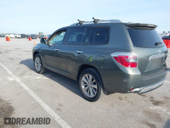 2009 Toyota Highlander Hybrid Limited with VIN JTEEW44A792032987, listed as a IAAI auction lot 42060184 with 258,761 mi miles. Bid and sale history available at carsss.com. Image 3.