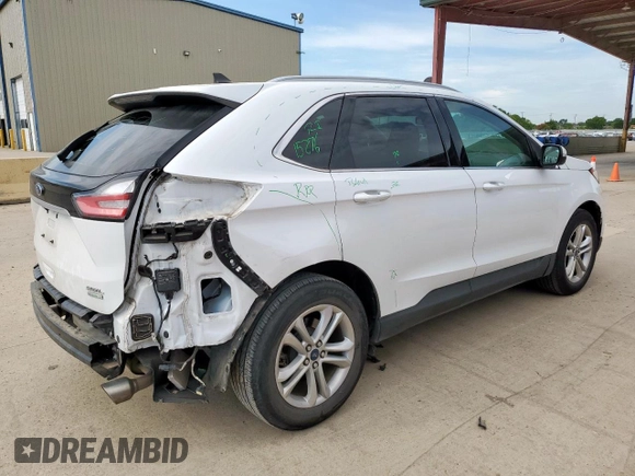 2020 Ford Edge SEL с VIN 2FMPK3J93LBB16928, выставлен на аукционе Copart как лот 63030385 с пробегом 81 567 миль миль и Чистый • Clean title. История ставок и продаж доступна на DreamBid. Изображение 3.
