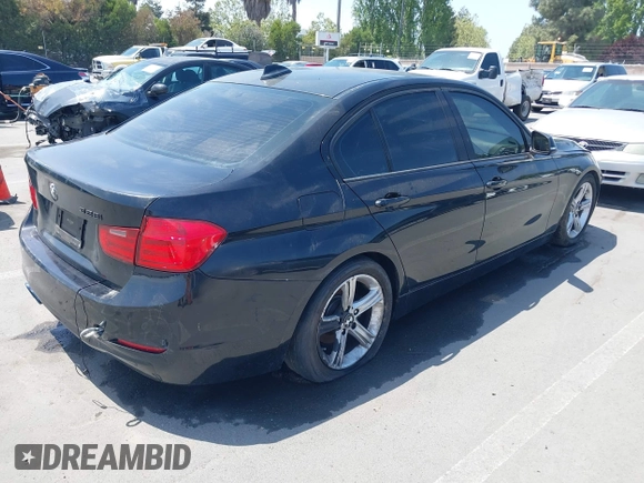 2013 BMW 3 Series 328i with VIN WBA3A5C52DF352107, listed as a IAAI auction lot 42169521 with 125,141 mi miles. Bid and sale history available at carsss.com. Image 4.