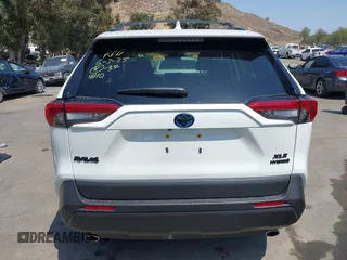 2024 Toyota RAV4 Hybrid XLE Premium with VIN JTMB6RFV9RJ063328, listed as a IAAI auction lot 42433233 with 9,874 mi miles and . Bid and sale history available at DreamBid. Image 17.