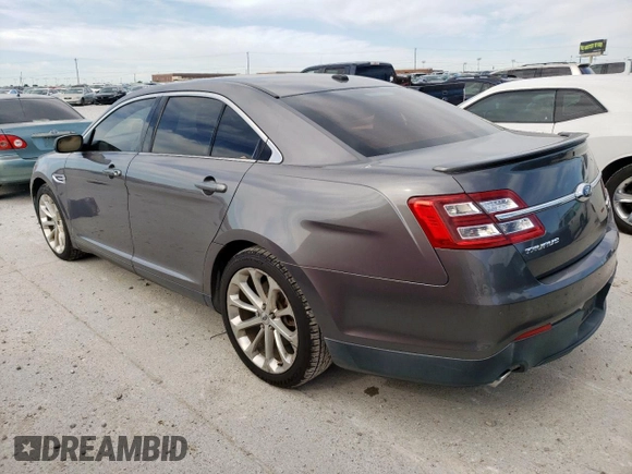 2013 Ford Taurus Limited z VIN 1FAHP2F89DG187913, wystawiony jako Copart lot #57096865 z przebiegiem 93 575 mil mil oraz Szkoda całkowita • Salvage title. Historia ofert i sprzedaży dostępna na DreamBid. Obrazek 2.