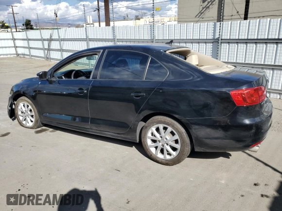 2011 Volkswagen Jetta SE with VIN 3VWDZ7AJ8BM383450, listed as a Copart auction lot 80899484 with 191,498 mi miles and Salvage title. Bid and sale history available at DreamBid. Image 2.