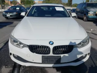 2015 BMW 4 Series 428i with VIN WBA3N7C54FK225367, listed as a IAAI auction lot 41958685 with 142,104 mi miles. Bid and sale history available at carsss.com. Image 12.