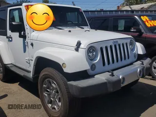 2014 Jeep Wrangler Sahara with VIN 1C4AJWBG3EL197444, listed as a Copart auction lot 64733055 with 193,278 mi miles and Clean title. Bid and sale history available at DreamBid. Image 1.