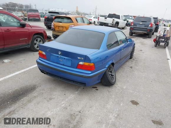 1999 BMW 3 Series M3 with VIN WBSBG9336XEY80979, listed as a IAAI auction lot 41179676 with 262,233 mi miles. Bid and sale history available at carsss.com. Image 4.