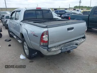 2009 Toyota Tacoma with VIN 3TMLU42N69M032320, listed as a IAAI auction lot 42280196 with 214,720 mi miles and . Bid and sale history available at DreamBid. Image 3.