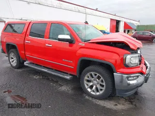 2017 GMC Sierra 1500 SLT z VIN 3GTU2NEC8HG279653, wystawiony jako IAAI lot #41988040 z przebiegiem 58 224 mil mil oraz . Historia ofert i sprzedaży dostępna na DreamBid. Obrazek 1.