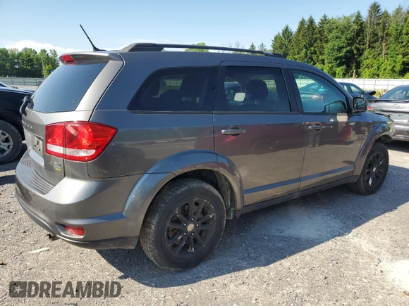 2013 Dodge Journey SXT with VIN 3C4PDCBGXDT630423, listed as a Copart auction lot 62359685 with 151,653 mi miles and Salvage title. Bid and sale history available at DreamBid. Image 3.