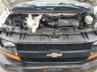 2013 Chevrolet Express Cargo z VIN 1GCSGAFX1D1133445, wystawiony jako Copart lot #56879675 z przebiegiem 201 501 mil mil oraz Tytuł czysty. Historia ofert i sprzedaży dostępna na DreamBid. Obrazek 11.