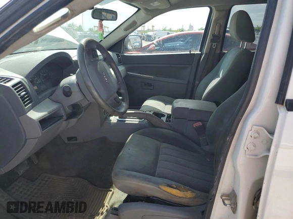 2006 Jeep Grand Cherokee Laredo с VIN 1J4GS48K16C300511, выставлен на аукционе Copart как лот 62196345 с пробегом 240 906 миль миль и Списание • Salvage title. История ставок и продаж доступна на DreamBid. Изображение 7.