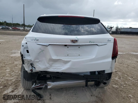 2022 Cadillac XT5 FWD Premium Luxury z VIN 1GYKNCRS0NZ175748, wystawiony jako Copart lot #61651885 z przebiegiem 13 747 mil mil oraz Szkoda całkowita • Salvage title. Historia ofert i sprzedaży dostępna na DreamBid. Obrazek 6.