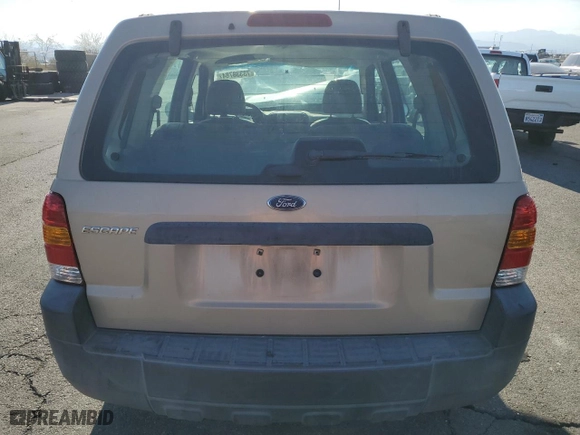 2007 Ford Escape XLS with VIN 1FMYU02Z77KB76668, listed as a Copart auction lot 73338784 with 166,759 mi miles and Salvage Title. Bid and sale history available at carsss.com. Image 6.