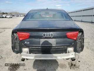 2013 Audi A8 3.0L z VIN WAUAGAFD3DN001326, wystawiony jako Copart lot #88724985 z przebiegiem 89 859 mil mil oraz Szkoda całkowita • Salvage title. Historia ofert i sprzedaży dostępna na DreamBid. Obrazek 6.