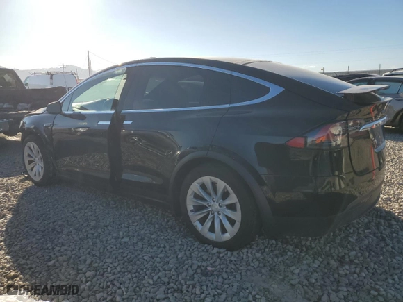 2019 Tesla Model X 75D with VIN 5YJXCAE24KF188385, listed as a Copart auction lot 48063375 with 0 mi miles and Salvage Title. Bid and sale history available at carsss.com. Image 2.
