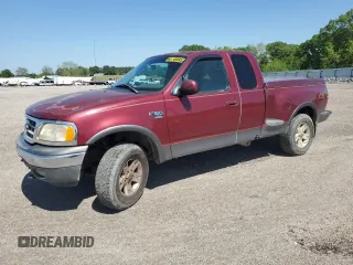 2003 Ford F-150 with VIN 1FTRX08WX3KC30956, listed as a Copart auction lot 52159615 with 215,948 mi miles and Salvage title. Bid and sale history available at DreamBid. Image 1.