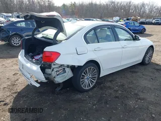2014 BMW 3 Series 335i xDrive with VIN WBA3B9C52EJ466045, listed as a IAAI auction lot 41281384 with 136,329 mi miles. Bid and sale history available at carsss.com. Image 4.