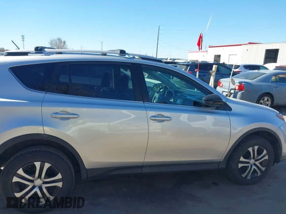 2015 Toyota RAV4 LE with VIN JTMBFREV2FD127754, listed as a IAAI auction lot 41877447 with 111,678 mi miles and . Bid and sale history available at DreamBid. Image 13.