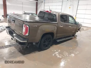 2016 GMC Canyon 4WD SLT z VIN 1GTP6DE13G1229783, wystawiony jako IAAI lot #41583360 z przebiegiem 80 149 mil mil oraz . Historia ofert i sprzedaży dostępna na DreamBid. Obrazek 4.