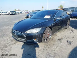 2015 Tesla Model S 85D with VIN 5YJSA1H46FF096603, listed as a IAAI auction lot 41084296 with 114,466 mi miles. Bid and sale history available at carsss.com. Image 2.