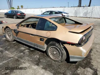 1987 Pontiac Fiero GT z VIN 1G2PG1194HP216891, wystawiony jako Copart lot #72103234 z przebiegiem 55 013 mil mil oraz Tytuł czysty. Historia ofert i sprzedaży dostępna na DreamBid. Obrazek 2.