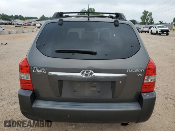 2007 Hyundai Tucson SE with VIN KM8JN12D07U520418, listed as a Copart auction lot 41568235 with 64,256 mi miles and Salvage Title. Bid and sale history available at carsss.com. Image 6.