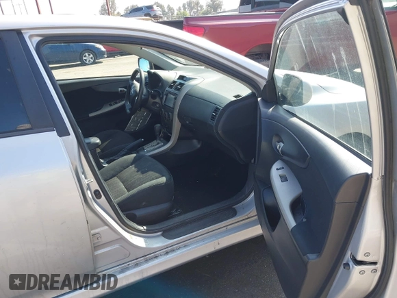 2012 Toyota Corolla L with VIN 2T1BU4EEXCC866050, listed as a IAAI auction lot 42140147 with 212,814 mi miles. Bid and sale history available at carsss.com. Image 5.