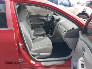 2010 Toyota Corolla with VIN 1NXBU4EE6AZ285981, listed as a IAAI auction lot 42101512 with 134,745 mi miles. Bid and sale history available at carsss.com. Image 5.