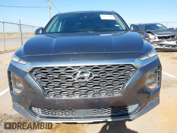 2019 Hyundai Santa Fe SE with VIN 5NMS23AD2KH134016, listed as a IAAI auction lot 41977240 with 61,448 mi miles and . Bid and sale history available at DreamBid. Image 12.