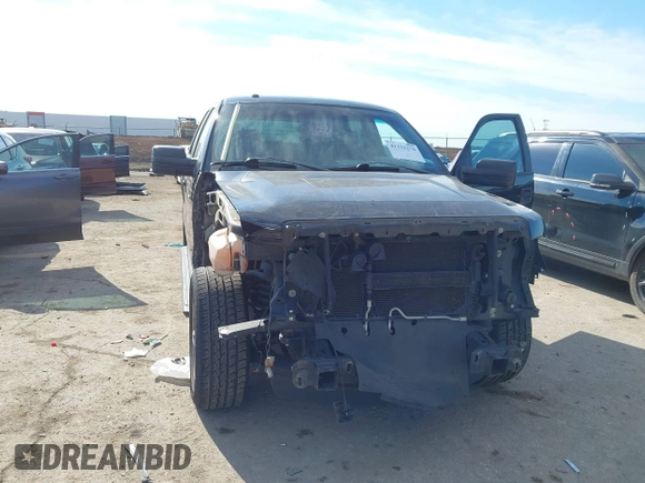 2014 Ford F-150 XL with VIN 1FTFW1CF6EKG04632, listed as a IAAI auction lot 41333274 with 153,094 mi miles. Bid and sale history available at carsss.com. Image 6.