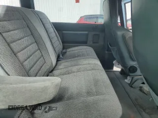 1989 GMC Safari z VIN 1GKDM15Z4KB517560, wystawiony jako Copart lot #51775615 z przebiegiem 152 882 mil mil oraz Szkody całkowita. Historia ofert i sprzedaży dostępna na DreamBid. Obrazek 11.