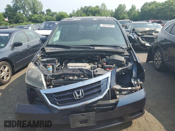 2010 Honda Odyssey EX-L z VIN 5FNRL3H73AB089714, wystawiony jako Copart lot #60276305 z przebiegiem 125 025 mil mil oraz Szkoda całkowita • Salvage title. Historia ofert i sprzedaży dostępna na DreamBid. Obrazek 5.