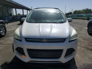 2013 Ford Escape SE z VIN 1FMCU9GX7DUC54856, wystawiony jako Copart lot #54767295 z przebiegiem 130 167 mil mil oraz Szkoda całkowita • Salvage title. Historia ofert i sprzedaży dostępna na DreamBid. Obrazek 5.
