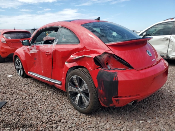 2012 Volkswagen Beetle 2.0T Turbo PZEV with VIN 3VWVA7AT5CM654978, listed as a Copart auction lot 66766654 with 60,842 mi miles and Salvage Title. Bid and sale history available at carsss.com. Image 2.