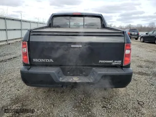 2010 Honda Ridgeline RTL with VIN 5FPYK1F57AB010749, listed as a Copart auction lot 45884225 with 165,016 mi miles and Salvage Title. Bid and sale history available at carsss.com. Image 6.