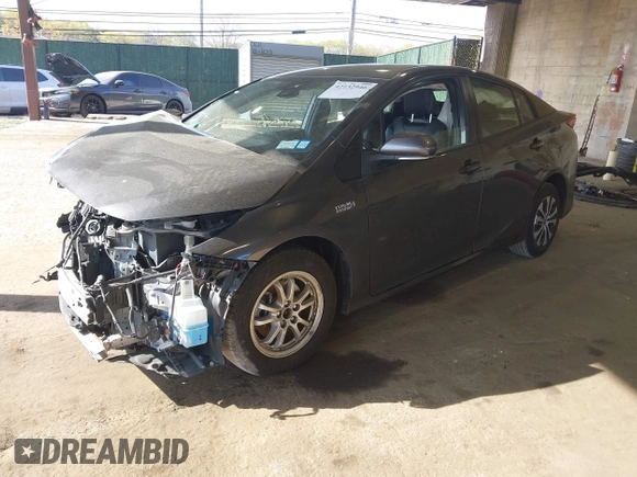 2021 Toyota Prius LE with VIN JTDKAMFP2M3168342, listed as a IAAI auction lot 42132946 with 69,628 mi miles and . Bid and sale history available at DreamBid. Image 18.