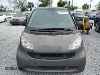 2012 Smart fortwo Pure z VIN WMEEJ3BA2CK519118, wystawiony jako Copart lot #57813115 z przebiegiem 127 472 mil mil oraz Tytuł czysty. Historia ofert i sprzedaży dostępna na DreamBid. Obrazek 5.