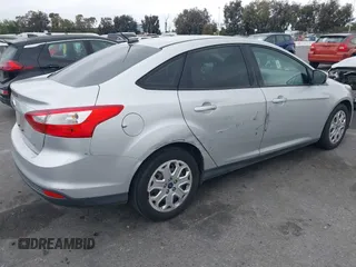 2012 Ford Focus SE with VIN 1FAHP3F27CL257447, listed as a IAAI auction lot 42180626 with 130,155 mi miles. Bid and sale history available at carsss.com. Image 4.