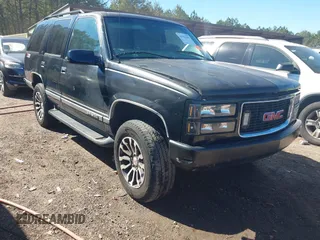 1999 GMC Yukon with VIN 1GKEK13R4XJ762708, listed as a IAAI auction lot 41653291 with 200,240 mi miles. Bid and sale history available at carsss.com. Image 1.