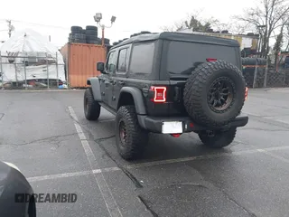 2022 Jeep Wrangler Unlimited Rubicon with VIN 1C4HJXFGXNW127064, listed as a IAAI auction lot 41491203 with 47,700 mi miles and . Bid and sale history available at DreamBid. Image 3.
