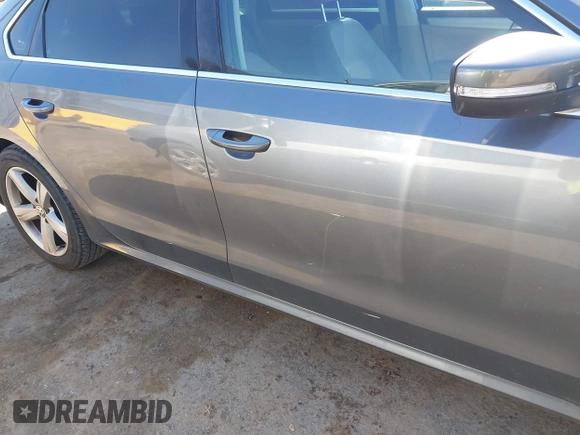 2013 Volkswagen Passat SE w/Sunroof & Nav with VIN 1VWBP7A35DC148149, listed as a IAAI auction lot 42148096 with 228,555 mi miles. Bid and sale history available at carsss.com. Image 6.