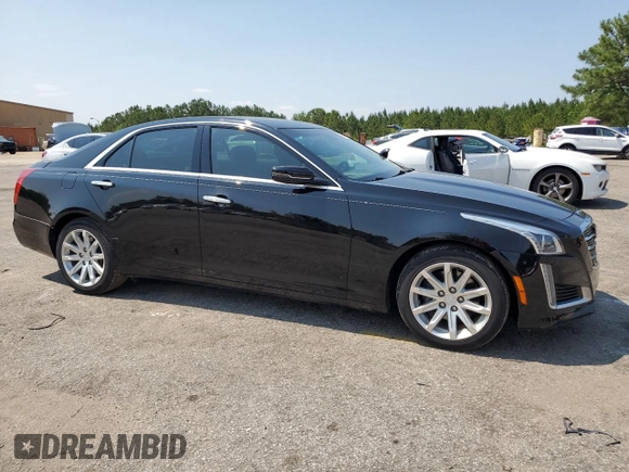 2015 Cadillac CTS Luxury RWD with VIN 1G6AR5SX2F0115311, listed as a Copart auction lot 58944915 with 34,764 mi miles and Salvage title. Bid and sale history available at DreamBid. Image 4.