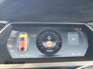 2013 Tesla Model S with VIN 5YJSA1AG5DFP12177, listed as a Copart auction lot 61846195 with 130,668 mi miles and Salvage title. Bid and sale history available at DreamBid. Image 9.