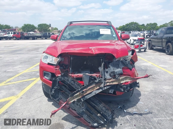 2016 Toyota Tacoma SR5 with VIN 5TFAX5GNXGX054633, listed as a IAAI auction lot 42088863 with 105,184 mi miles and . Bid and sale history available at DreamBid. Image 6.